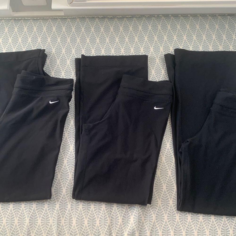Nike yoga pants. 2 medium. 1 Small. Will separate.